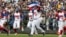 Peloteros cubanos celebran después de la victoria del equipo sobre Taiwán durante un juego del Grupo A del Clásico Mundial de Béisbol, en el Estadio Intercontinental de Béisbol de Taichung, en Taiwán. (Foto AP/I-Hwa Cheng)