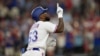 El cubano Adolis García, de los Rangers de Texas, festeja luego de conectar un jonrón de tres carreras en el tercer juego de la serie divisional de la Liga Americana ante los Orioles de Baltimore, el martes 10 de octubre de 2023. (AP Foto/Julio Cortez)