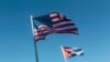 Banderas de Estados Unidos y Cuba. (Reuters).