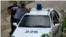 Carro policial. Vigilancia a disidentes en Holguín, Robier Cruz/ Reporta Cuba.