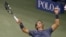 El tenista español Rafael Nadal celebra después de vencer al serbio Novak Djokovic el lunes 9 de septiembre de 2013, en la final masculina del Abierto de Tenis de Estados Unidos.