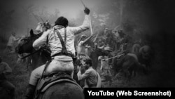 Mambises cargan al machete. 