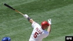 El jugador dominicano de Los Angelinos de Los Ángeles, Albert Pujols (d).