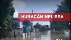 Residentes de Río Cauto sortean las inundaciones de Melissa