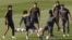 Los jugadores del Real Madrid, Pepe (i), Marcelo Vieira da Silva (2d), Carlos Henrique Casemiro (3d) y Gareth Bale (i), durante el entrenamiento del equipo celebrado en la Ciudad Deportiva de Valdebebas con motivo de la preparación previa al partido de la
