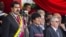 El presidente de Venezuela, Nicolás Maduro (i), acompañado por sus pares de Cuba, Raúl Castro (d), y de Bolivia, Evo Morales (c), durante el desfile militar para conmemorar el primer aniversario del la muerte del fallecido mandatario venezolano Hugo Cháve