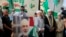 Miembros de Hamas asisten a una protesta para condenar la muerte en un ataque del jefe político de Hamas, Ismail Haniyeh. (Foto AP/Mohammed Zaatari)